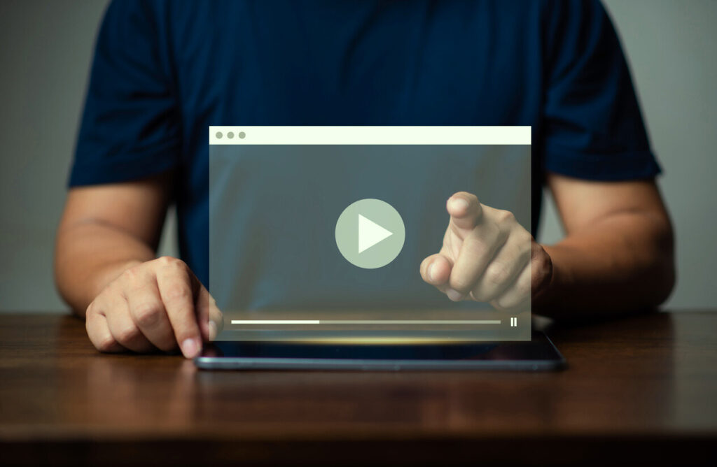 multimedia player and online streaming concept, man watching online show or tutorial on video streaming website.