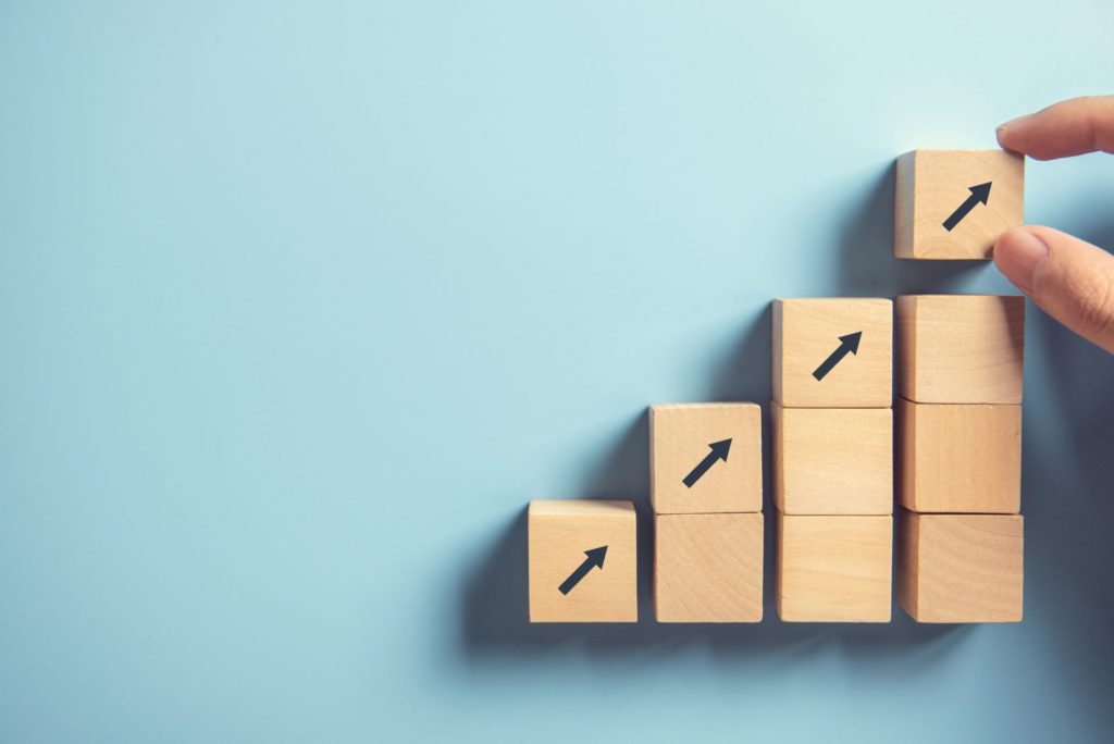 blocks arranged into step formation with arrows pointed upward